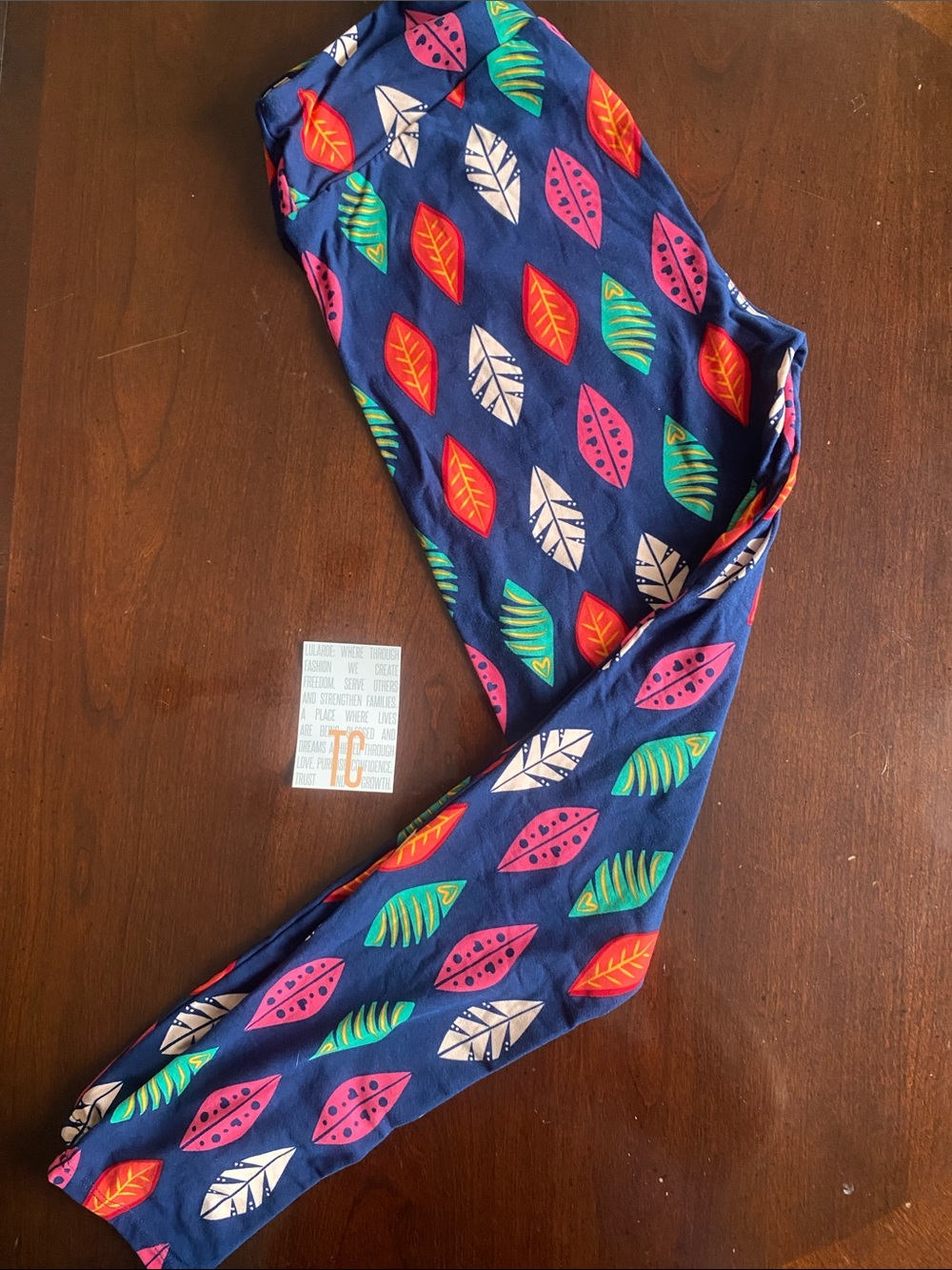 LuLaRoe Navy Leggings with Pink, Red, Green & White Leaf Print